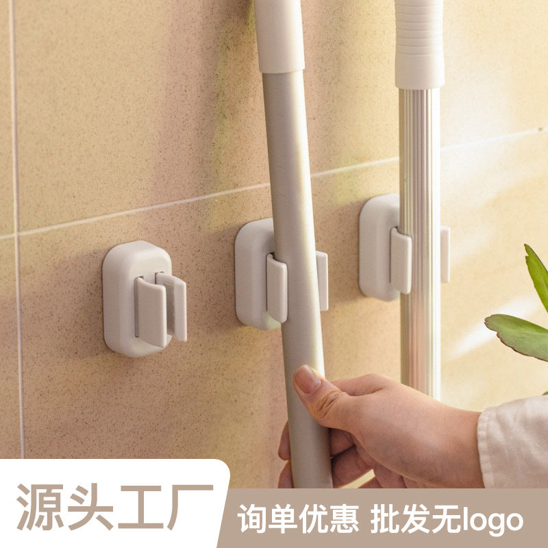 拖把架免打孔挂钩挂壁厕所浴室强力粘卡座扫把拖布夹固定架卡扣Mop holder – no-drill hooks for wall mounting in toilets and bathrooms; strong adhesive mounts; broom and mop clips; fixing brackets and clips