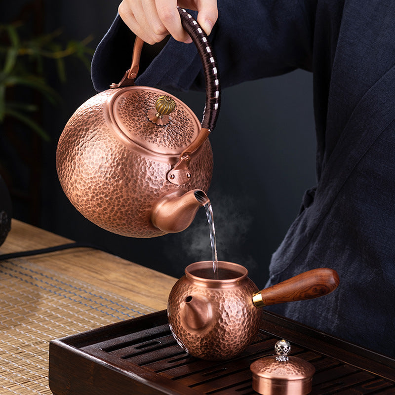 创意家用复古煮茶烧水手工紫铜壶 大容量养生带茶隔带提梁泡茶壶Creative Vintage-Style Handcrafted Red Copper Teapot for Home Use—Large-Capacity Health-Conscious Teapot with Tea Strainer and Handle