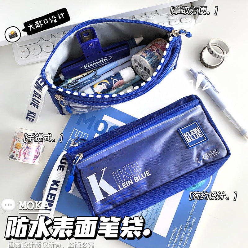 MOKA克莱因蓝三角笔袋高颜值大容量学生帆布文具袋男孩简约款MOKA Klein Blue Triangle Pencil Case: Stylish, Large-Capacity Canvas School Supply Bag for Boys—Minimalist Style