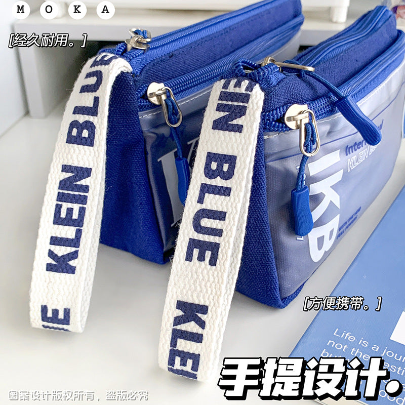 MOKA克莱因蓝三角笔袋高颜值大容量学生帆布文具袋男孩简约款MOKA Klein Blue Triangle Pencil Case: Stylish, Large-Capacity Canvas School Supply Bag for Boys—Minimalist Style