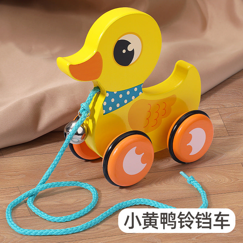 儿童学步拖拉玩具拉着走玩手拉车卡通形象动物木质拉线学步车Children’s pull-along toys for toddlers: pull-along toy carts featuring cartoon animal characters – wooden pull-along walkers